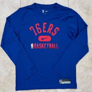 Nike Dri-FIT Philadelphia 76ers T-Shirt
Size: Medium (10/12)
Color: Blue/Red